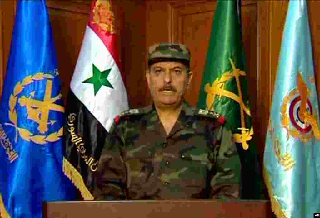 In this image released by the Syrian official news agency SANA, Fahd Jassem al-Freij, Syria's new defense minister, reads a statement after he was appointed by President Bashar Assad on July 18, 2012.