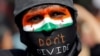 A demonstrator attends a protest against riots following clashes between people demonstrating for and against a new citizenship law in New Delhi, March 3, 2020.