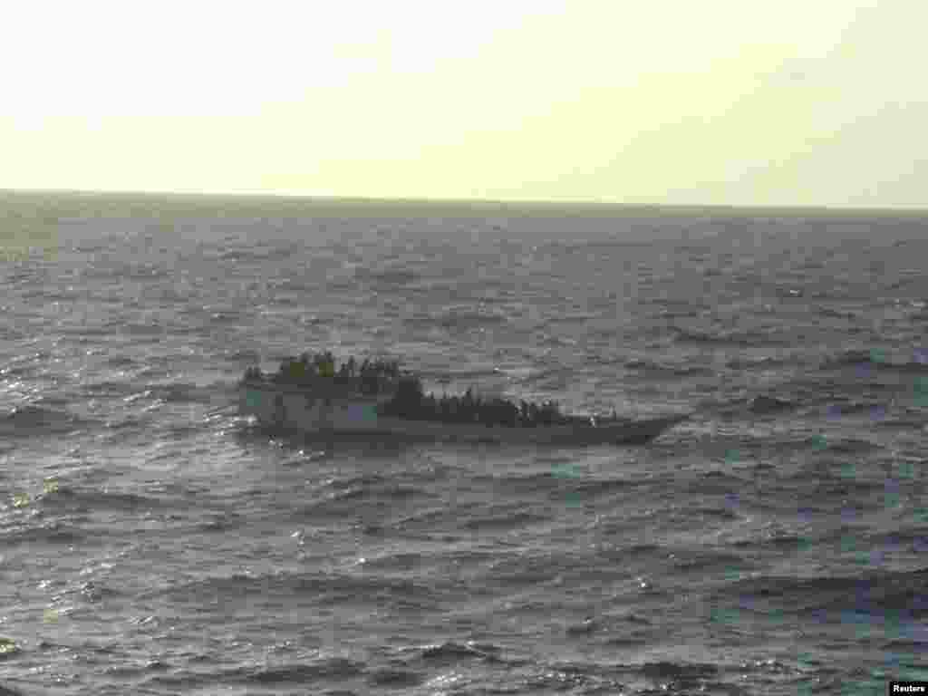This boat, carrying about 150 suspected asylum seekers capsized June 27, 2012 between Indonesia and Australia's Christmas Island in the India Ocean, the second such incident in less than a week, highlighting Australia's struggle to stem the flow of boat people.