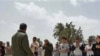 Pro-Government Shelling in Libya Delays Relief Mission