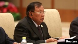 Presiden Laos Bounnhang Vorachith di Diaoyutai State Guesthouse, Beijing, China, 16 Mei 2017. (REUTERS/Wu Hong/Pool)