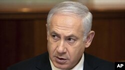 Israel's Prime Minister Benjamin Netanyahu, pictured here at a weekly meeting of his cabinet April 3, 2011, has issued a written statement calling on the UN to retract its Gaza war crimes report