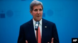 FILE - U.S. Secretary of State John Kerry addresses the media during a news conference on the sidelines of the NATO Foreign Ministers' conference.