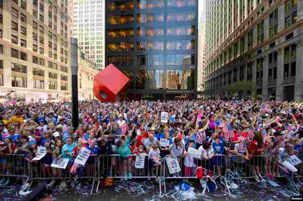 Fans watch the ticker-tape parade to celebrate the United States' Women's World Cup championship, in New York City, July 10, 2015. (Robert Deutsch-USA TODAY Sports)