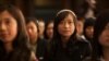 Chinese students listen to President Obama speak during a town hall in China.