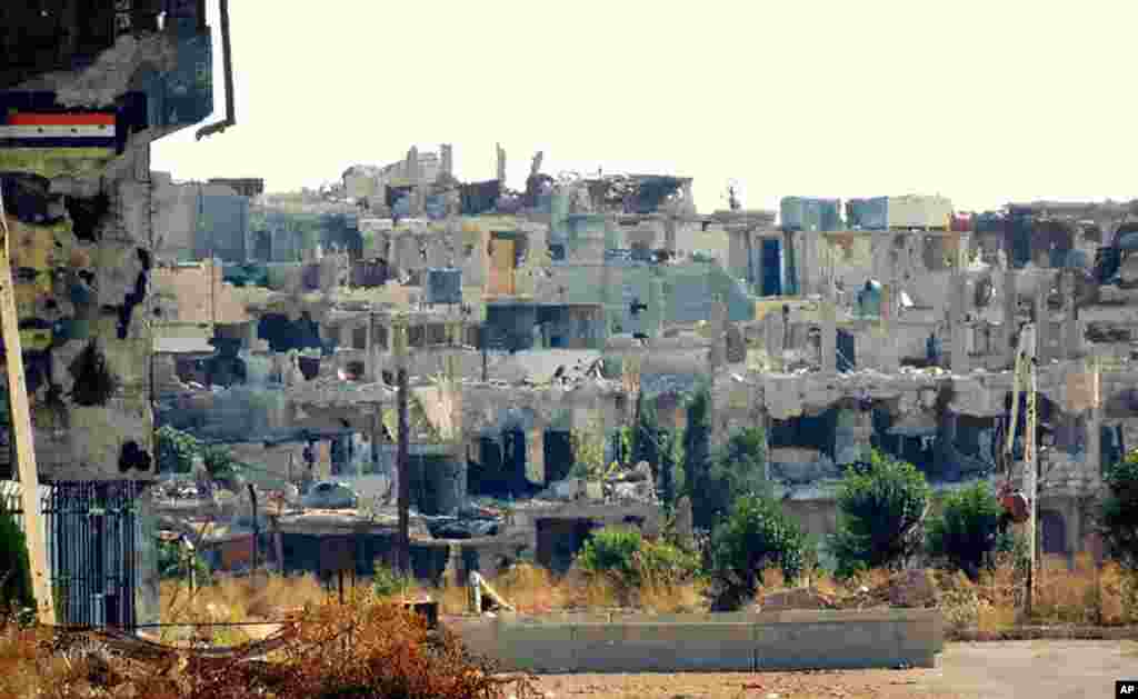 Destroyed houses, the result of shelling by Syrian government forces, in the Baba Amr neighborhood of Homs province, Syria, October 18, 2012.