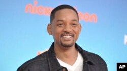 FILE - Will Smith arrives at the Nickelodeon Kids' Choice Awards in Los Angeles, March 23, 2019.