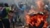 Masu Zanga-zanga A Congo Sun Kona Tutocin Amurka Da Belgium Kusa Da Ofishin MDD