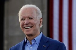 FILE - Democratic presidential candidate Joe Biden acknowledges the crowd during a campaign rally in Kansas City, Mo., March 7, 2020.