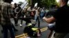 Experts: Saturday's Violence the Result of Political Pressure Cooker