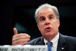 Department of Justice Inspector General Michael Horowitz testifies on Capitol Hill, June 19, 2018, in Washington.