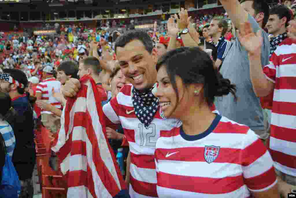 USA soccer supporters' section at FedEx Field prior to kick-off. Many fans wore the U.S. national team's new horizontal red-and-white striped jersey, introduced earlier this year. VOA/M. Lipin