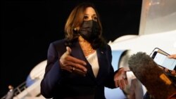 Vice President Kamala Harris talks to the press gathered under the wing of Air Force Two as she prepares to depart for Mexico, from Guatemala's Air Force Central Command, Monday, June 7, 2021. (AP Photo/Jacquelyn Martin)