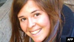 (FILE)This undated handout file photo obtained Feb. 6, 2015, courtesy of the Mueller family and the office of U.S. Senator John McCain shows 26-year-old Kayla Jean Mueller. 