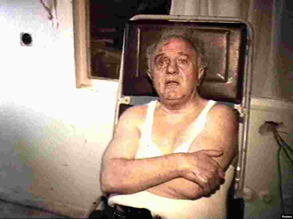 Georgian leader Eduard Shevardnadze is seen in this television picture with cuts and bruises after escaping an apparent assassination attempt August 29, 1995.