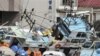 One Week After Disaster Japan Ponders Future