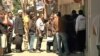Customers lining up in front of a bank in Cyprus, Mar 28, 2013.