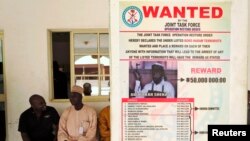  A poster advertising for the search of Boko Haram leader Abubakar Shekau is pasted on a wall in Baga village on the outskirts of Maiduguri, in the north-eastern state of Borno, Nigeria, May 13, 2013.