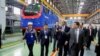 U.S. Secretary of State John Kerry visits a locomotive manufacturing plant in the Kazak capital of Astana that represents an economic partnership between General Electric (GE) and Kazakhstan, Nov. 2, 2015. 