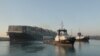 Stuck Ship Thrusts Sleepy Suez Canal Village into Limelight 
