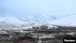 FILE - A view shows the area, which came under the control of Azerbaijan's troops following a military conflict over Nagorno-Karabakh against ethnic Armenian forces and a further signing of a cease-fire deal, in Jabrayil District, Dec. 7, 2020.
