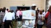 A man carries a ballot box in Malabo on April 23, 2016 on the eve of the first round of the Equatorial Guinea presidential elections.