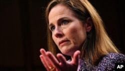 Supreme Court nominee Amy Coney Barrett testifies during the third day of her confirmation hearings before the Senate Judiciary Committee on Capitol Hill in Washington, Wednesday, Oct. 14, 2020.(Andrew Caballero-Reynolds/Pool via AP)