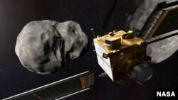 This artist’s illustration depicts NASA’s DART spacecraft, which will be launched to crash into an asteroid to see how the crash affects the space object’s path. (Image Credit: NASA/Johns Hopkins APL)