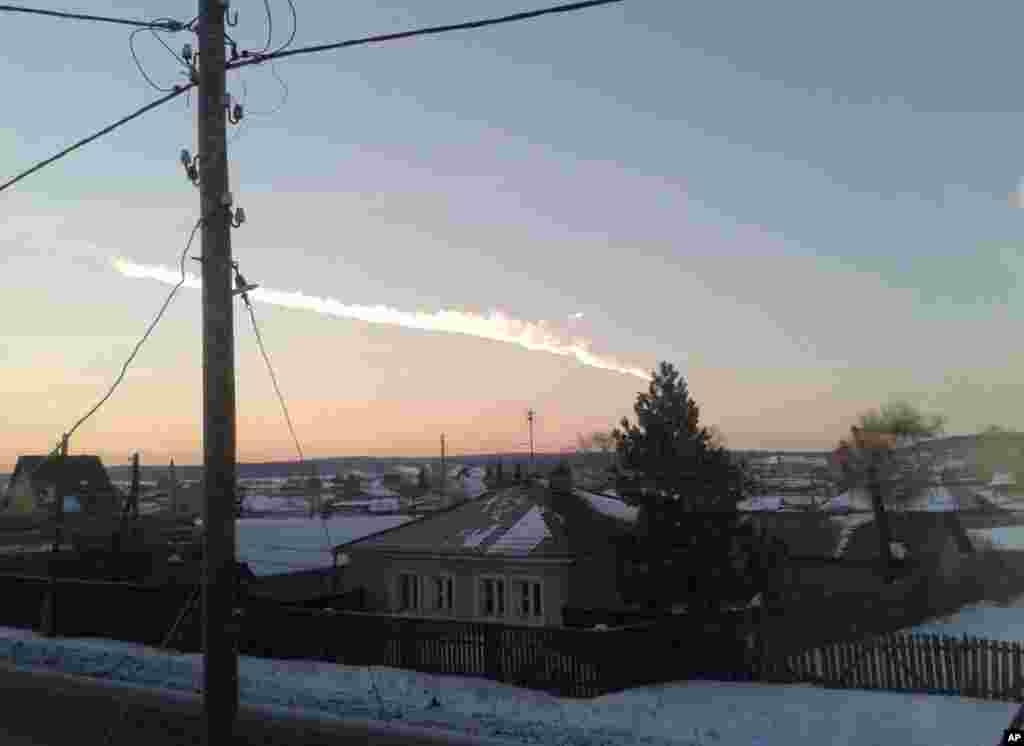 The meteorite contrail is seen over the village of Bolshoe Sidelnikovo, February 15, 2013.