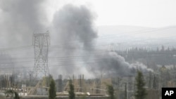 Smoke rises in the countryside of Damascus, Syria, on Oct. 30, 2021, following what Syrian state media said was an Israeli airstrike.