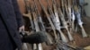 The arms, which were confiscated from the Garda World private security company are shown to media in Kabul, Afghanistan, January 5, 2012.