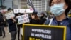 Police Targets of Both Love and Anger in Hong Kong Rallies