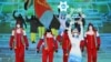 Eritrea's flag bearer, Shannon-Ogbnai Abeda, leads the delegation during the opening ceremony of the Beijing 2022 Winter Olympic Games, in Beijing, on Feb. 4, 2022.
