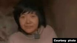 中國徐州豐縣被鎖鏈栓住的八孩媽媽。