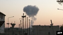 Smoke rises following a reported airstrike on the town of Maaret al-Numan in Syria's northwestern Idlib province, Nov. 20, 2019.