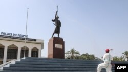Kenya and Somalia have agreed to try to reduce diplomatic tensions at a conference this week in Djibouti. A firefighter sprays the area in front of the People's Palace, a public ceremony hall, in Djibouti, on May 14, 2020.