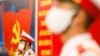 FILE - Vietnamese soldiers, wearing protective masks, stand guard at the National Convention Center, the venue for the 13th National Congress of the Communist Party of Vietnam during the coronavirus disease (COVID-19) outbreak in Hanoi, Vietnam, January 28, 2021. REUTERS/Kham 