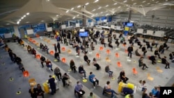 A general view of the interior of a converted call center, which is being used as an NHS COVID-19 vaccination center in Ramsgate, England, Dec. 16, 2021.