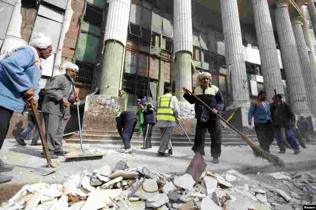 A view of the front of a damaged building of a court complex after an explosion in Imbaba, north of Cairo, Jan. 14, 2014.