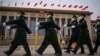 China Increases Defense Budget, Adopts Tougher Language for Taiwan
