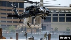 El presidente Barack Obama ha solicitado la autorización para enviar 275 soldados a Irak para proteger la embajada estadounidense.