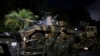 ARCHIVO - El ejército de Brasil traslada vehículos blindados de Manaos a Boa Vista para reforzar la frontera con Venezuela y Guyana debido a las tensiones por los reclamos venezolanos sobre la región de Esequibo, en Manaos, Brasil, el 2 de febrero de 2024.