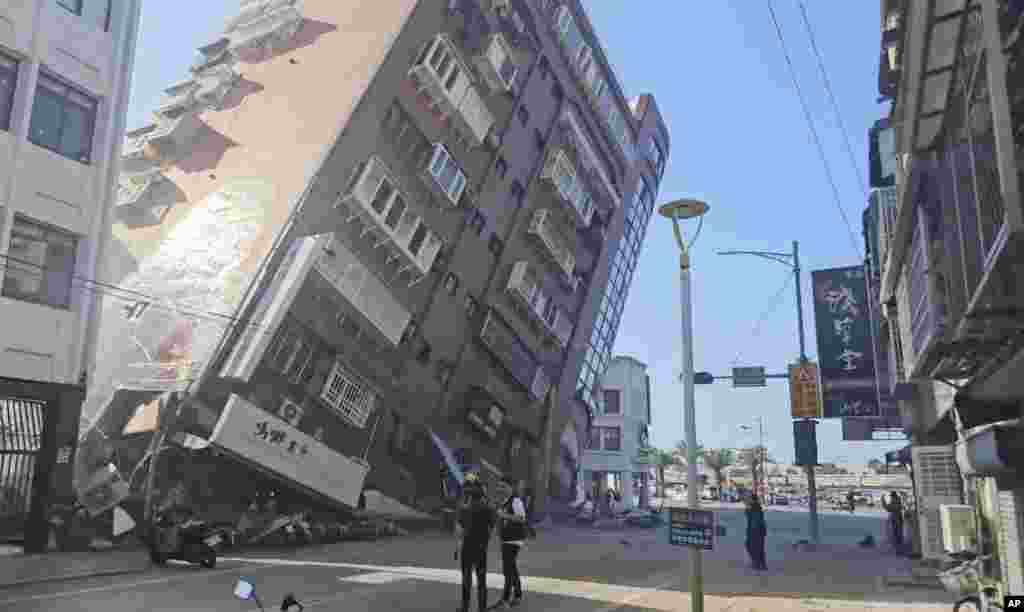 In this image taken from a video footage run by TVBS, a partially collapsed building is seen in Hualien, eastern Taiwan, April 3, 2024. 
