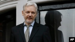 FILE - WikiLeaks founder Julian Assange speaks from the balcony of the Ecuadorian Embassy in London, Feb. 5, 2016.