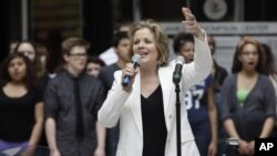 Famed soprano Renee Fleming performs with high school students in Chicago, where the opera singer has been mentoring teenaged vocal students as creative consultant at the Lyric Opera of Chicago.