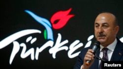Turkish Foreign Minister Mevlut Cavusoglu at the International Tourism Trade Fair ITB in Berlin, Germany, March 8, 2017. 