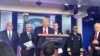 U.S. President Donald Trump briefs reporters at a news conference on the latest steps the United States is taking to fight the coronavirus disease (COVID-19) outbreak, Washington D.C., March 22, 2020. (C. Presutti/VOA)