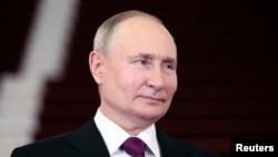 Presiden Rusia Vladimir Putin menghadiri upacara penyambutan Forum Baru Inisiatif Sabuk dan Jalan di Beijing, China, 17 Oktober 2023. (Foto: Sputnik/Sergei Savostyanov/Pool via REUTERS)