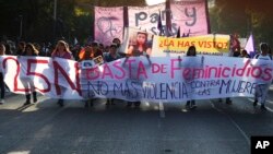 Women march to mark the International Day for the Elimination of Violence Against Women, in Mexico City, Nov. 25, 2017