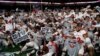 College Leaders Talk While Football Players Push to Play
